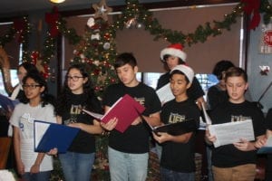 Hester Junior High School Choir performs for Chamber By O’Hare Christmas Gathering