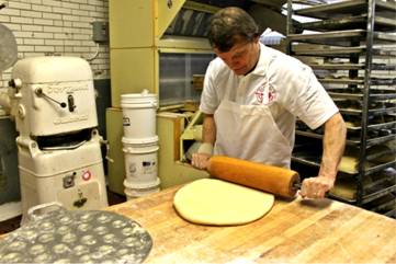 Rolling out the dough at Dinkel's Bakery